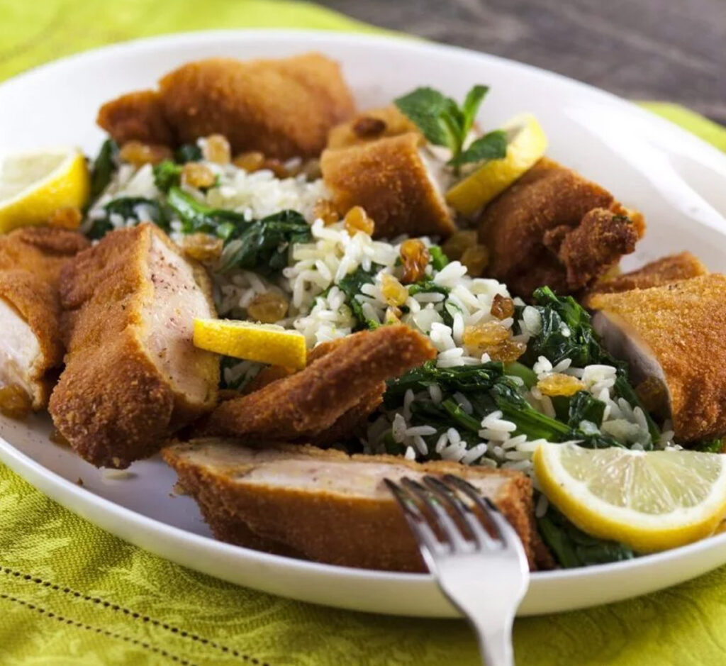 Supremos de frango panados com arroz de grelos